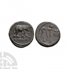 Julius Caesar - Elephant AR Denarius 49 B.C. Italy mint. Obv: elephant walking right trampling dragon; CAESAR in exergue. Rev: simpulum, sprinkler, ax...
