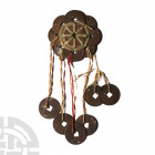 China - Cash Amulet Set 19th century A.D. An amuletic windchime formed from fifteen cast Chinese cash coins held together with thin cords for hanging....