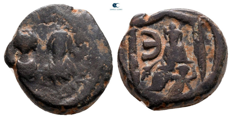 Justin I & Justinian I AD 527. Antioch
Pentanummium Æ

13 mm, 2,68 g



n...