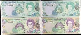 CAYMAN ISLANDS. Lot of (4). Cayman Islands Monetary Authority. 50 Dollars, 2001-03. P-29a, 32a & 32b. Low Serial Numbers. About Uncirculated to Uncirc...