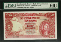 NEW ZEALAND. The Reserve Bank of New Zealand. 50 Pounds, ND (1956-67). P-162c. PMG Gem Uncirculated 66 EPQ.
The note is a large format TDLR printed p...