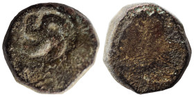 POST-MAURYAN (Punjab). Taxila (local coinage), circa 1st century BC. Ae (bronze, 1.63 g, 12 mm). Swastika turning right in round incuse. Rev. Figure s...