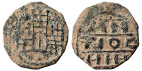 CRUSADERS. Principality of Antioch. Anonymous, 1120-1140. (bronze, 0.89 g, 16 mm). The city walls of Antioch, with a gate and three towers. Rev. AN/TI...