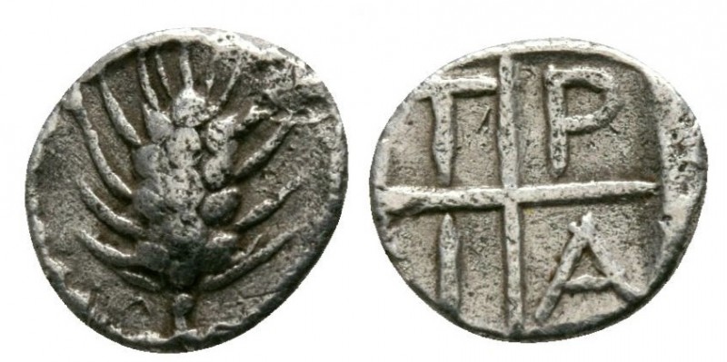 Macedonia, Tragilos, 450 - 400 BC
Silver Hemiobol, 6mm, .29 grams
Obverse: Gra...