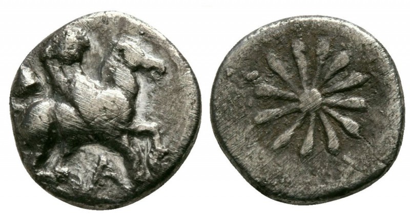 Ionia, Erythrai, 480 - 450 BC
Silver Trihemiobol, 9mm, 1.01 grams
Obverse: Peg...