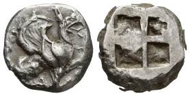 IONIA, Teos, (c. 510-500 B.C,), silver stater (18mm, 12.1 g). obv. Griffin seated right, raising forepaw, swan before, rev. Quadripartite incuse squar...