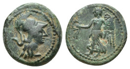 Greek Æ (14mm, 2.4 g). Head of Athena r., wearing Corinthian helmet; above, Rev. Nike walking l., carrying wreath and palm.