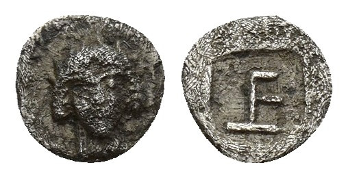 Ionia. Kolophon circa 450-410 BC. Tetartemorion AR 6 mm, 0,1 g Facing head of Ap...