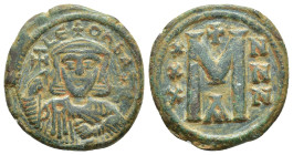 Leo V Æ Follis. Leo V Æ Follis. (22mm, 6,3 g) Constantinople, 813. Crowned and draped bust facing, holding cross potent and akakia / Large M; cross ab...