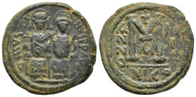 Justin II. 565-578. Æ Follis (30.2mm, 14.9 g). Nicomedia mint. Justin and Sophia, both nimbate, enthroned facing; Justin holding globus cruciger and S...