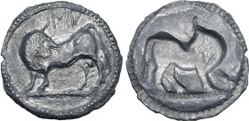 Lucania, Sybaris AR Stater. Circa 550-510 BC. Bull standing to left, head to right; MV above / Incuse of obverse. SNG ANS -; HN Italy 1729; HGC 1, 123...