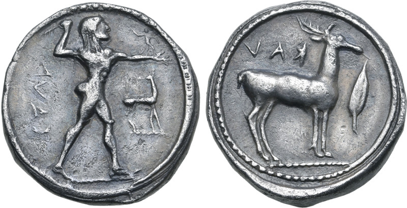 Bruttium, Kaulonia AR Stater. Circa 475-425 BC. Nude Apollo walking to right, ho...