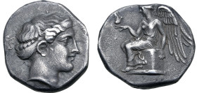 Bruttium, Terina AR Stater. Signed by unknown die engraver 'Π'. Circa 420-400 BC. Head of the nymph Terina to right, wearing sphendone; [TEPINAI]O[N] ...
