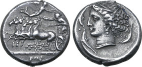 Sicily, Panormos (as Ziz) AR Tetradrachm. Circa 340-320 BC. Charioteer, holding kentron in extended right hand and reins in left, driving fast quadrig...