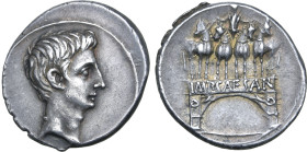 Octavian AR Denarius. Italian mint (Rome?), autumn 30 - summer 29 BC. Bare head to right / Single span triumphal arch surmounted by Octavian in facing...