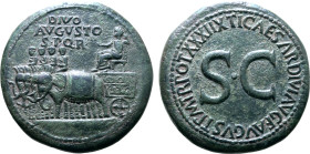 Divus Augustus Æ Sestertius. Rome, AD 36-37. Deified Augustus, holding laurel-branch and long sceptre, seated to left on car pulled to left by quadrig...