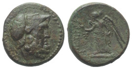 Bruttium. Petelia.

 Bronze. Ca. 215 - 204 v. Chr.
Vs: Kopf des bärtigen Ares mit korinthischem Helm rechts.
Rs: Nike nach links stehend, Kranz in...