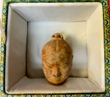 WESTERN HAN: head of terracotta figure (459.00g), ca. 106 x 79 x 66mm, made from red clay, with clear facial features and hair bun at the top of the h...