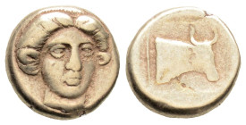 Greek
LESBOS, Mytilene (Circa 412-378 BC)
EL Hekte – Sixth Stater (5.7mm, 2.48g)
Obv: Head of Io facing slightly right
Rev: Head of bull right in line...