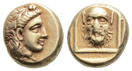 Greek
LESBOS, Mytilene (Circa 377-326 BC)
EL Hekte (5.5mm, 2.55g)
Obv: Wreathed head of Dionysos right.
Rev: Head of satyr facing, with full head of h...