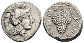 Greek
CILICIA, Soloi (Circa 385-350 BC)
AR Stater (20.4mm, 10.2g) 
Obv: Helmeted head of Athena to right, helmet decorated with a griffin 
Rev: Grape ...