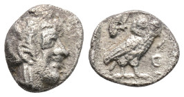 Greek
ATTICA, Athens (Circa 454-404 BC)
AR Obol (9.5mm, 0.6g)
Obv: Helmeted head of Athena right 
Rev: AΘE. Owl standing right, head facing; olive spr...