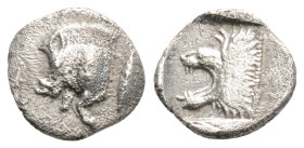 Greek 
MYSIA, Kyzikos (Circa 450-400 BC)
AR Obol (8.8mm, 0.46g)
Obv: Forepart of boar left; to right, tunny upward.
Rev: Head of roaring lion left wit...