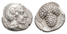 Greek
CILICIA, Soloi (Circa 400-350 BC)
AR Obol (8,9mm, 0.5g)
Obv: Head of Athena to right, wearing crested Attic helmet. 
Rev: Grape bunch on vine.
G...