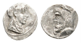 Greek
CILICIA. Uncertain Satrap (circa 450-350)
AR Tetartemorion (6.3mm 0.10g)
Obv: Head of young male to right.
Rev: Bearded head left, wearing satra...