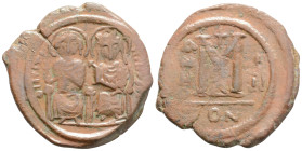 Byzantine
Justin II, with, Sophia (567/8 AD) Constantinople
AE Nummi (32mm, 11.5g)
Obv: D N IVSTINVS P P AI, nimbate imperial couple seated facing on ...