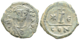 Byzantine 
Maurice Tiberius (582-602 AD) Constantinople
AE Decanummium (13.9mm 2.7g)
Obv: Crowned, draped and cuirassed bust facing.
Rev: Large I; cro...