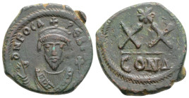Byzantine
Phocas (602-610 AD) Constantinople
AE Half Follis (23.2mm, 6.6g)
Obv: D N FOCAS PERP AVC. Crowned bust facing, wearing consular robes and ho...