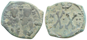 Byzantine
Phocas, with Leontia (602-610 AD)
AE Half Follis (22.4mm, 4.4g)
Obv: Phocas and Leontia standing facing; cross above
Rev: Large XX;
DOC 93; ...