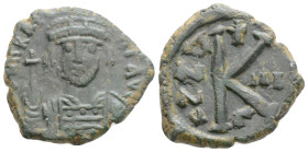 Byzantine
Heraclius (610-641 AD) Constantinople
AE Nummi (20.4mm, 4g)
Obv: Crowned and cuirassed bust facing, holding globus-cruciger. 
Rev: Large K; ...