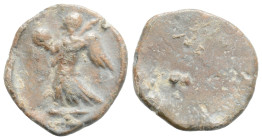 ASIA MINOR. Uncertain. 2nd-3rd centuries. 
Tessera (Lead, 16.7 mm,1.6 g). 
Obv: Victoriy advancing to left, holding globe (?) in his right hand and pa...