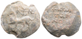 Byzantine Lead Seal ( 5th century)
Obv: Horse stepping r. Above Cruciform monogram
Rev: 3 (three) lines of text.
(17 g, 18.4 mm diameter)