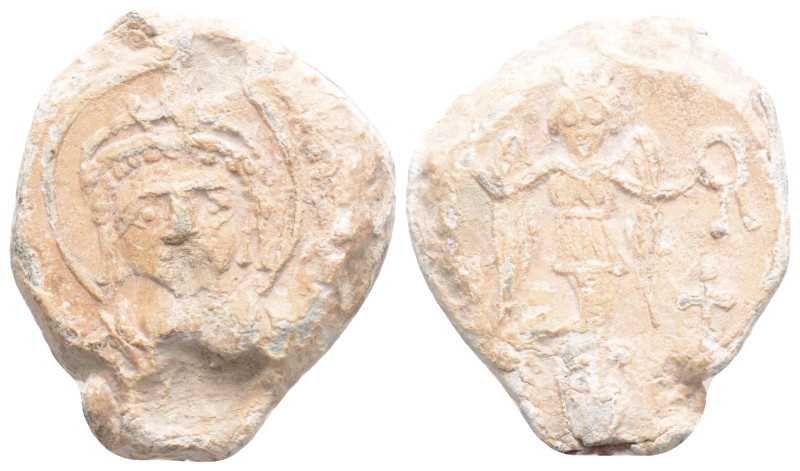 Byzantine Lead Seal ( 527-565 AD)
Obv: Nimbate, helmeted, and cuirassed facing b...