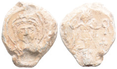 Byzantine Lead Seal ( 527-565 AD)
Obv: Nimbate, helmeted, and cuirassed facing bust of Justinian
Rev: Angel standing facing, holding two wreaths; to l...