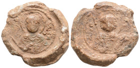 Byzantine Lead Seal (11th Century)
Obv: St. frontal, halo. He is holding a spear in his right hand and a shield in his left. Pearl border.
Rev: St. fr...