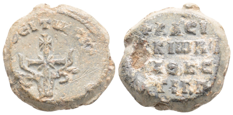 Byzantine Lead seal. ( 9th-10th centuries)
Obv: Cross crosslet set upon base; fl...