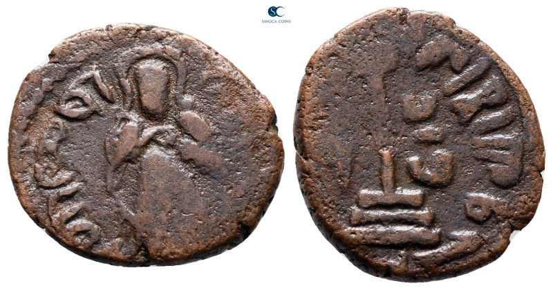 Umayyad Caliphate. Time of 'Abd al-Malik ibn Marwan AH 65-86. 
Fals Æ

15 mm,...