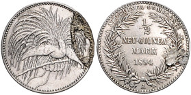 Deutsch-Neuguinea. 
1/2 Neuguinea-Mark 1894, 2 Stück, Jaeger N704.

beide bearb. mit Lötspuren (wohl aus Brosche), ss