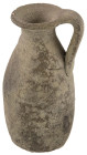 Antike Objekte
 kleiner Henkelkrug aus graubraunem Ton, H ca. 10 cm, Ø ca. 5 cm