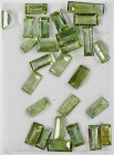 Mineralien
 27 hellgrüne Turmaline im Baguette Schliff, insgesamt ca. 12,5 ct.