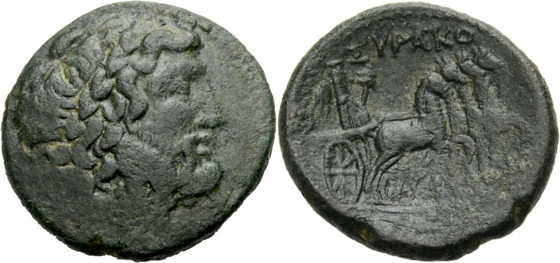 Sizilien. 
Syrakus. 
Kopf des bärtigen Zeus mit Lorbeerkranz n.r. Rv. SURAKO-S...