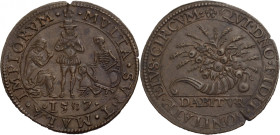 Niederlande/-Rechenpfennige. 
Dordrecht. Rechenpfennig, Bronze, 1587. Auf die Hungersnot in Atrecht (Arras). Spanier frontal stehend, zwischen der n....