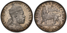 Ethiopia
Menelik II 1889-1913 1/2 Birr, EE 1887 (1894), AG 
Ref : KM#4
Conservation : NGC MS 64