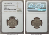 Kiangnan. Kuang-hsü 20 Cents CD 1902 AU55 NGC, KM-Y143a.8, L&M-249. An elegant specimen dressed in unimpeded milky-champagne patination that contrasts...