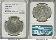 British Colony. Victoria Dollar 1867 AU Details (Polished) NGC, KM10, Prid-2. Representing a fleeting three-year issue with muted argent surfaces that...