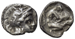 Southern Apulia, Tarentum, c. 380-325 BC. AR Diobol (11,5mm, 1,08g). Helmeted head of Athena r., helmet decorated with hippocamp. R/ Herakles, holding...